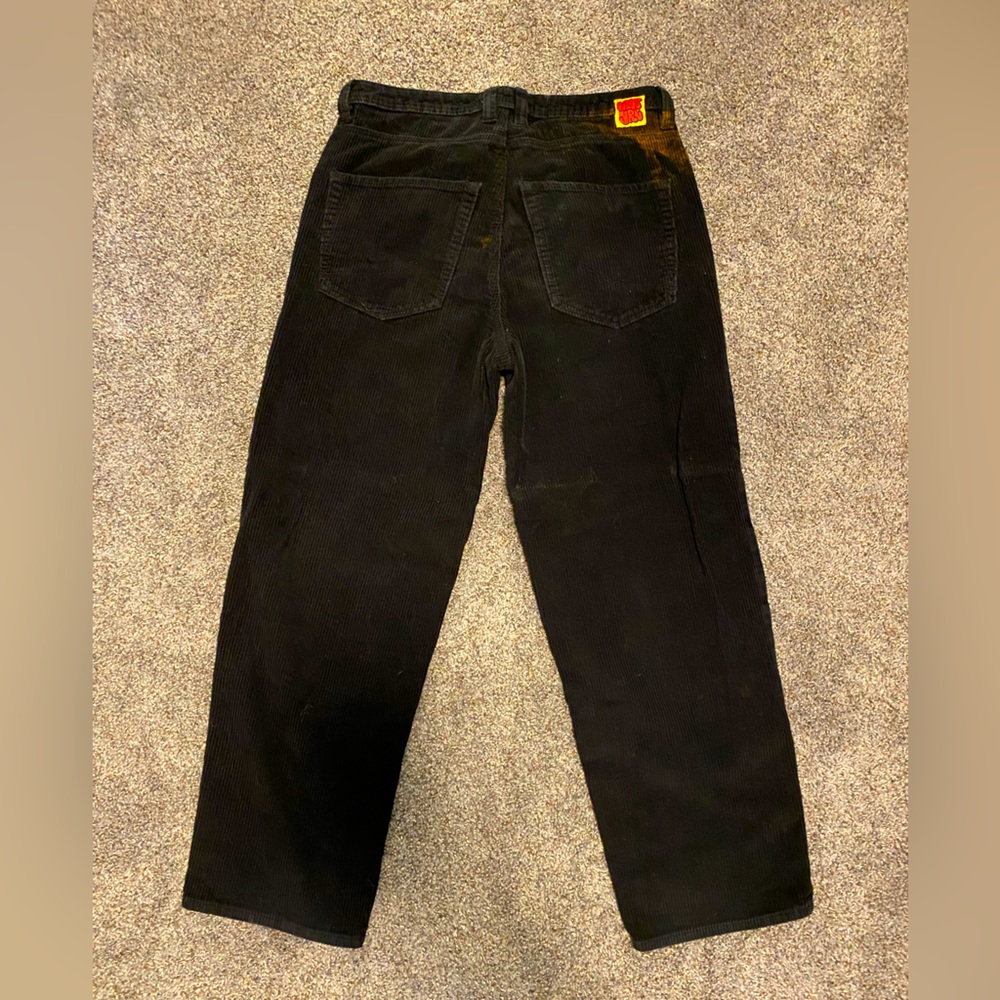 Size 32 Black empyre corduroy. Like new, bleach mark is the only problem.